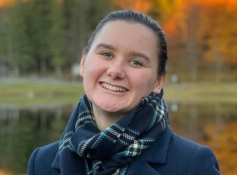 Laura — Communications Manager