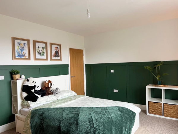 Green bedroom headboard panelling
