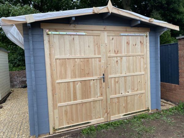 Matchboard cladding door