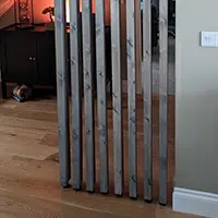 Wooden slat timber room divider in gun powder