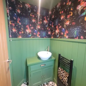 Bathroom bead and butt wall panelling with sink
